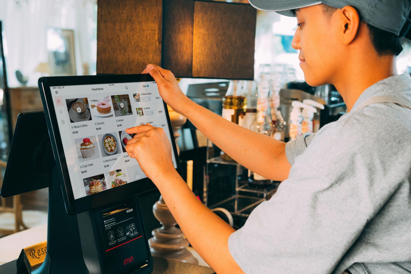 Frontline retail employee using a mobile phone at work
