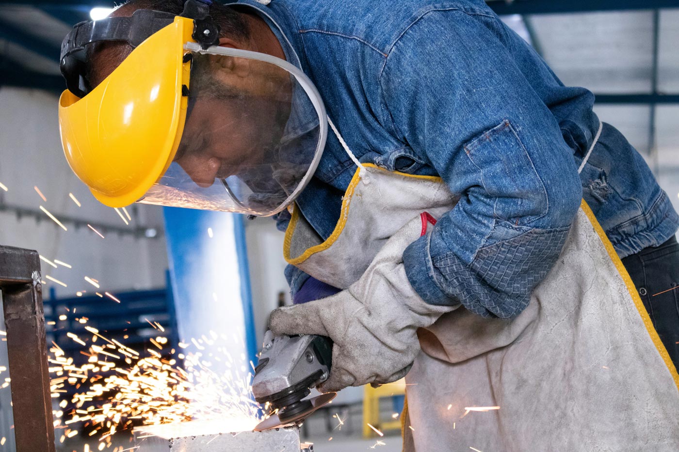 Warehouse worker using a mobile phone on the job